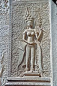 Angkor Wat temple, the fourth enclosure, the bas reliefs of the west gopura, superbly preserved devatas, either individually or in groups of two or three, amongst the finest in the monument. 